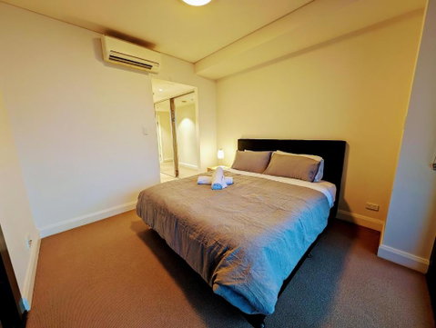 Rhodes Two Bedroom Apartment With Fantastic Water View - Inverell Accommodation 1